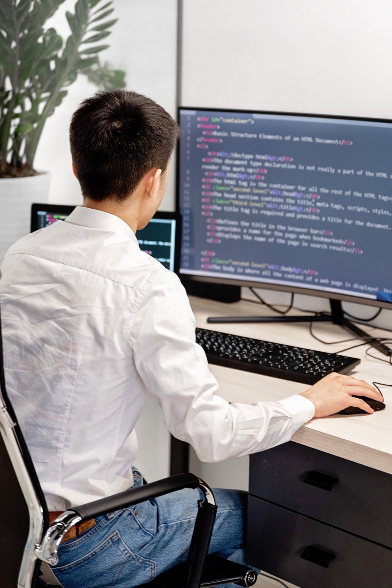 Developer building a website with Basic AI's stack